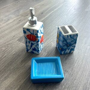 Soap dispenser, toothbrush holder and soap dish